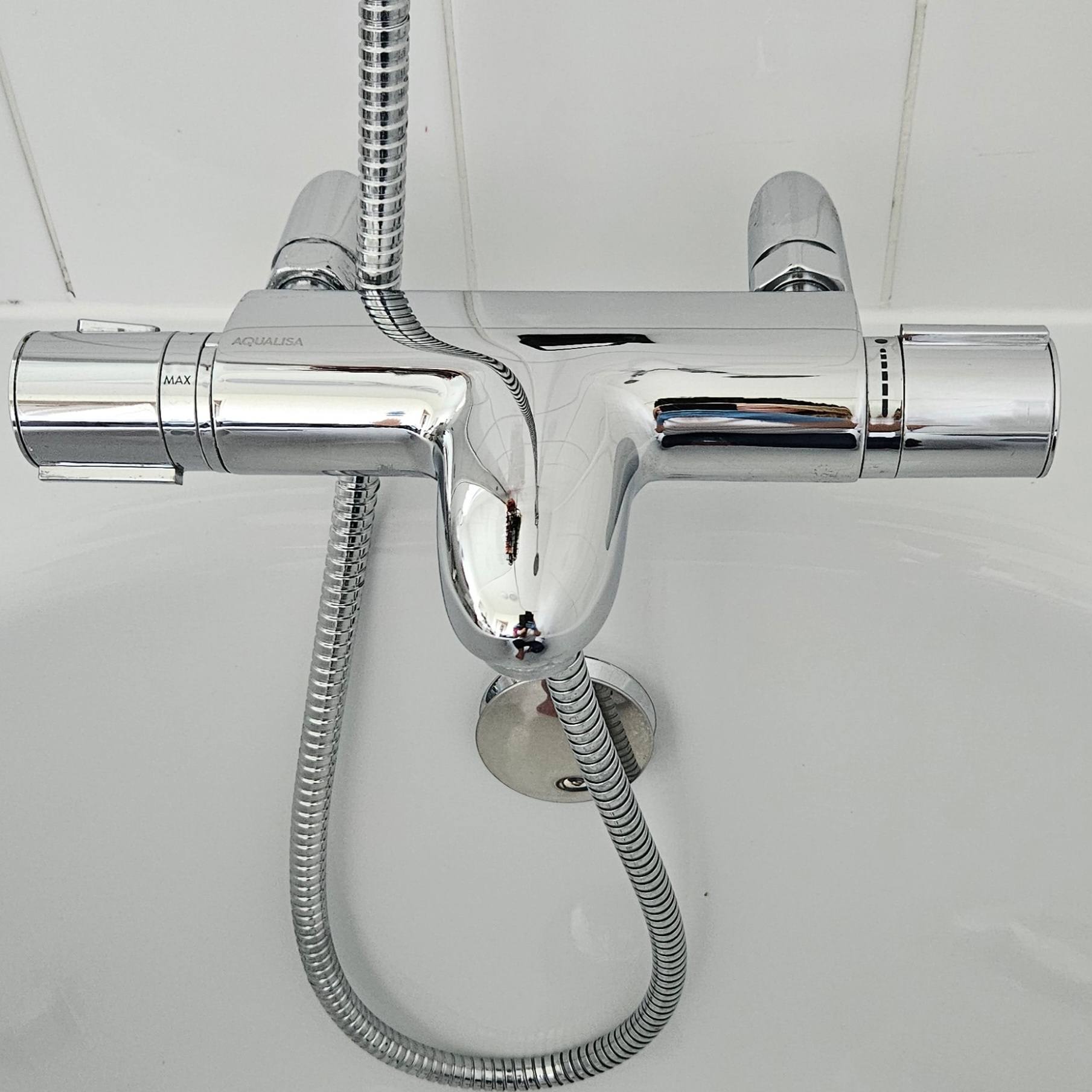 Sparkling clean bathroom tap after cleaning